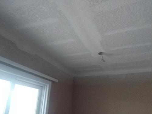 Client had severe water damage to bedroom ceiling.  We installed all new 5/8" sheetrock per building code on the ceiling, taped, finished and spray textured a medium Knockdown texture to match the existing texture in the home.